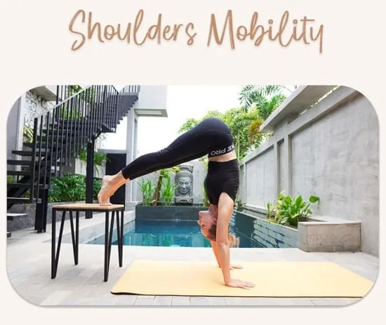 Hanna demonstrating a shoulders mobility exercise using a yoga mat and a chair in an outdoor setting, showcasing shoulder flexibility as part of the Circus Stretching program.